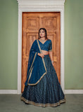 WOMEN,S TEAL GEORGETTE FOIL PRINT WITH EMBROIDERED ZARI SEQUENCE WORK DESIGNER LEHENGA CHOLI