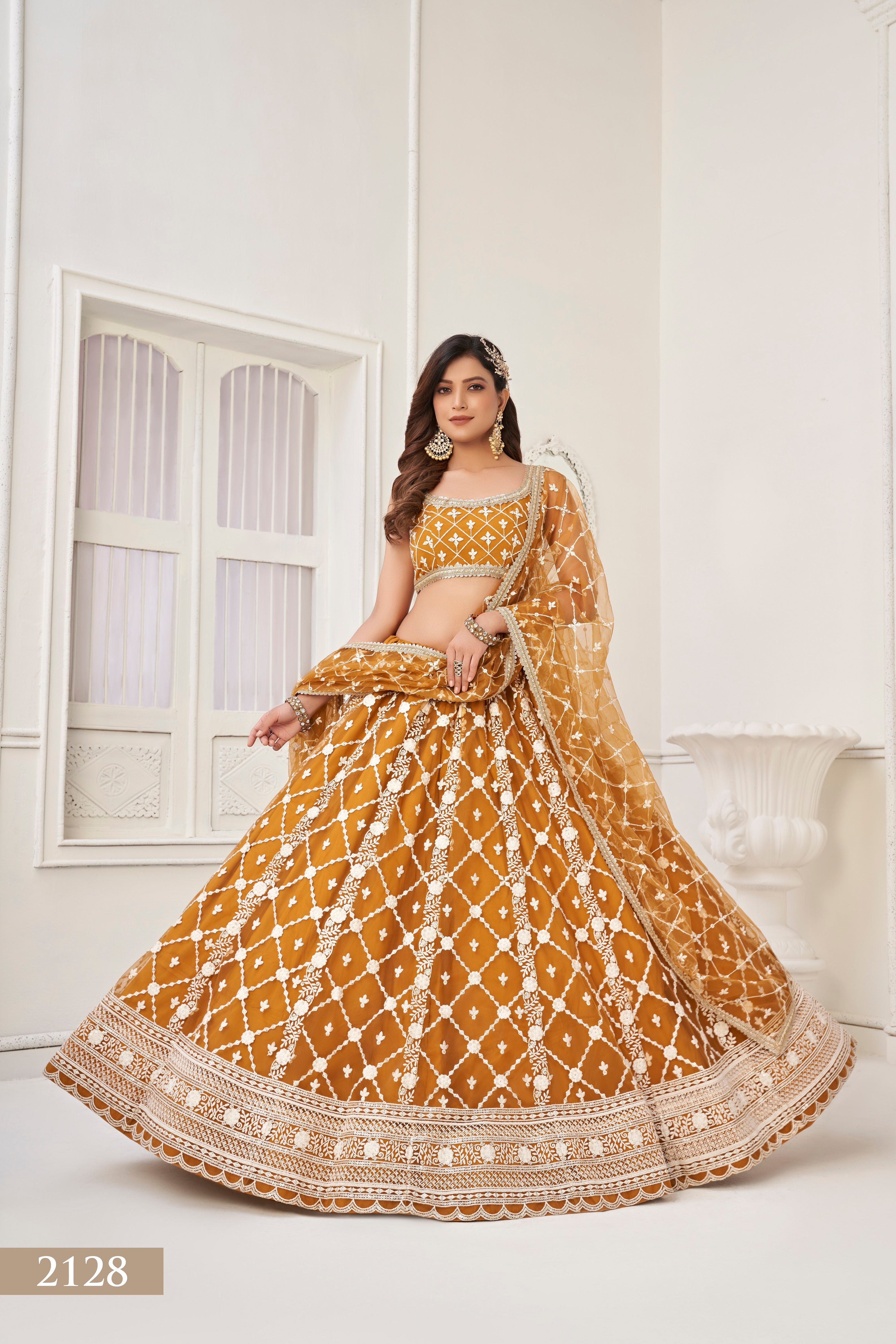 WOMEN'S BROWN BUTTERFLY NET WITH SEQUINS AND EMBROIDERY WORK LEHENGA CHOLI FOR PARTY WEAR