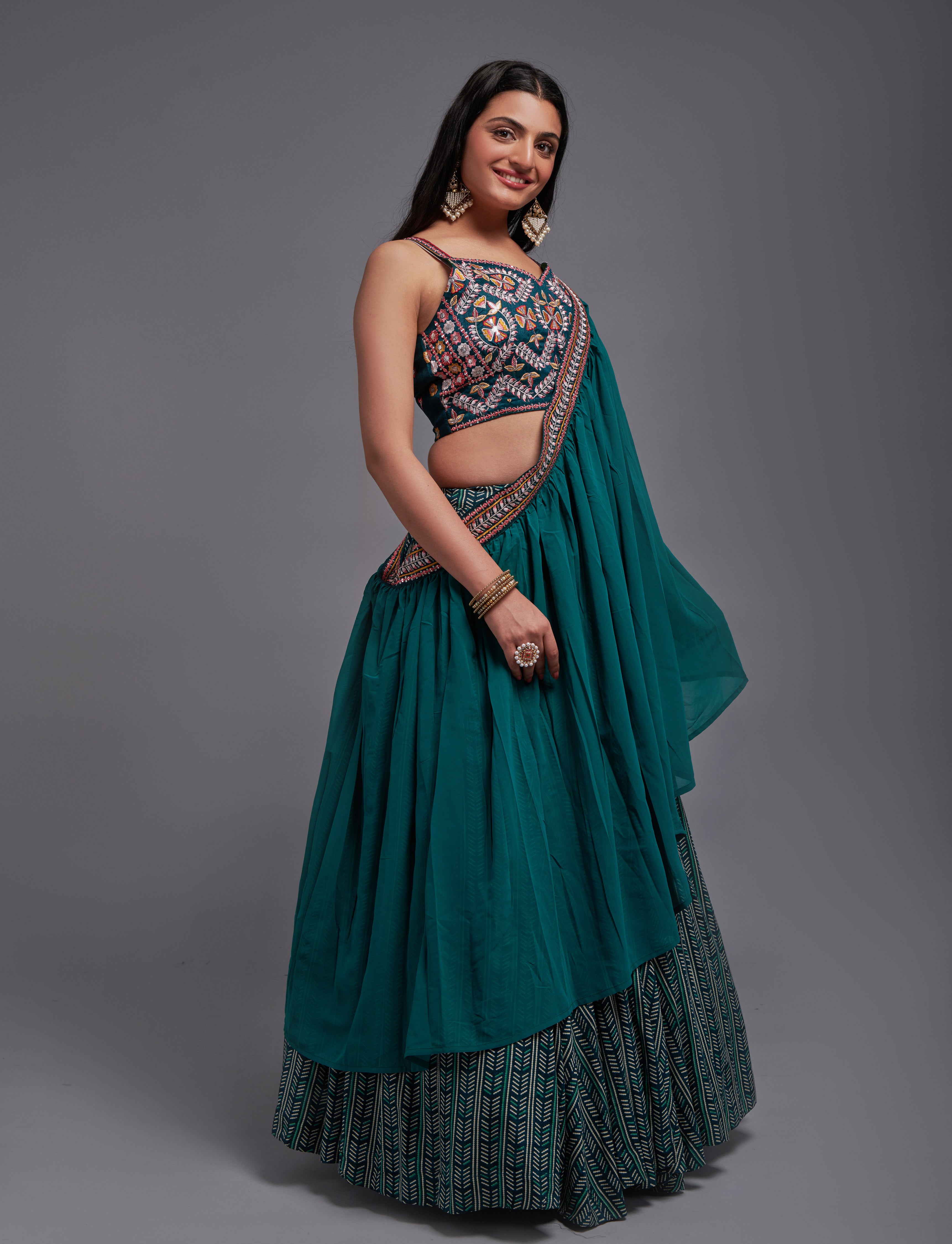 WOMEN'S TEAL GEORGETTE WITH SEQUINS AND THREAD EMBROIDERY WORK LEHENGA CHOLI