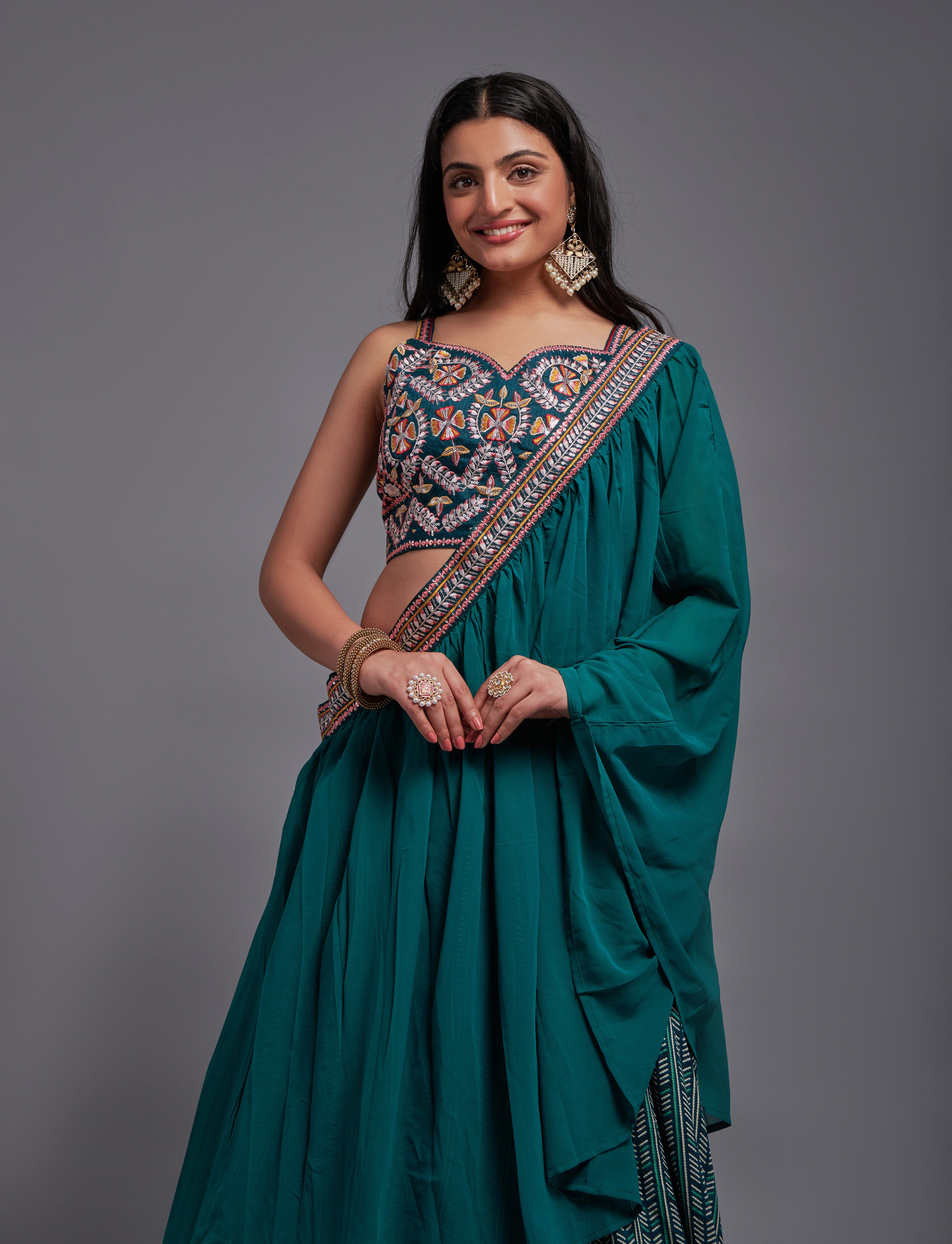 WOMEN'S TEAL GEORGETTE WITH SEQUINS AND THREAD EMBROIDERY WORK LEHENGA CHOLI