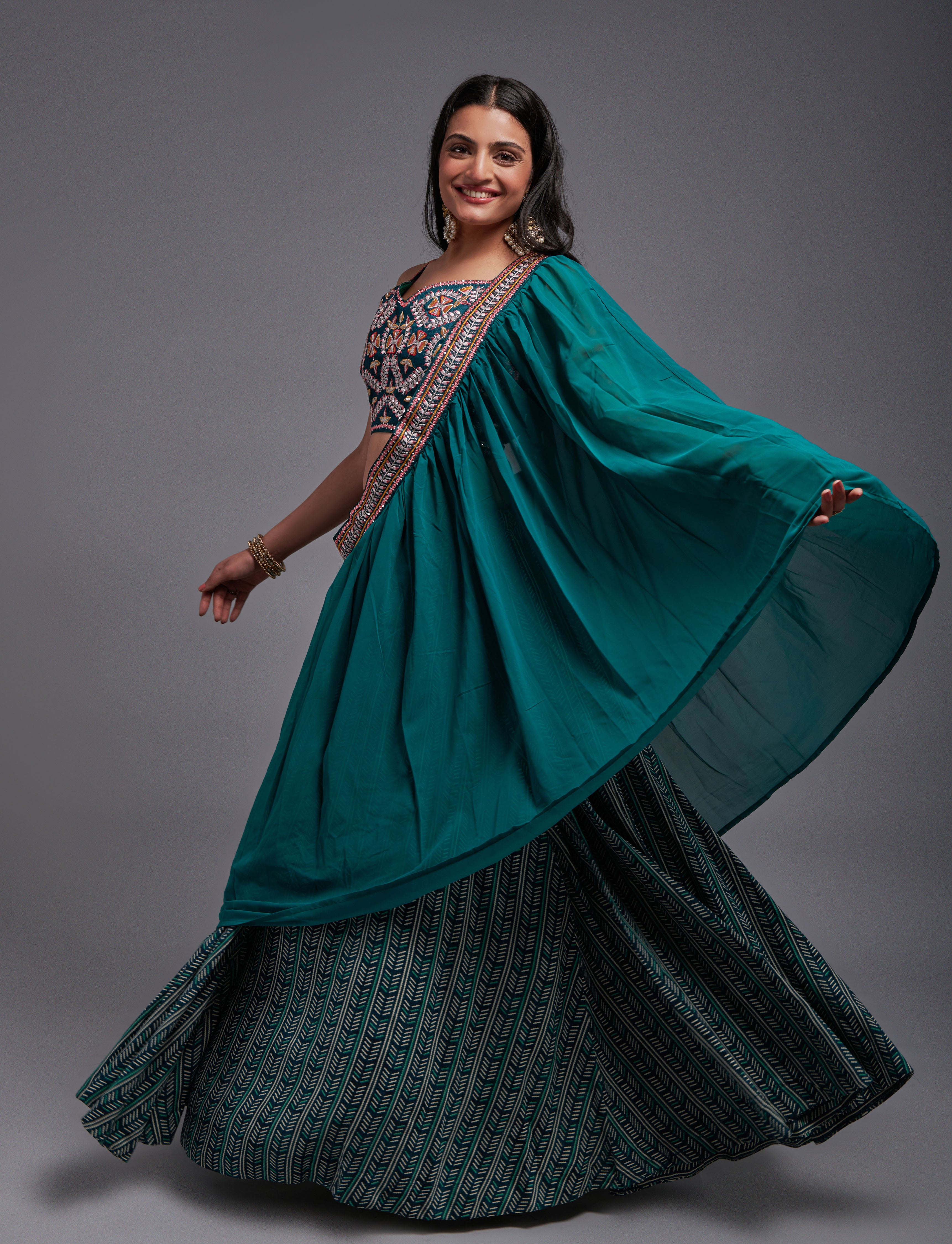 WOMEN'S TEAL GEORGETTE WITH SEQUINS AND THREAD EMBROIDERY WORK LEHENGA CHOLI