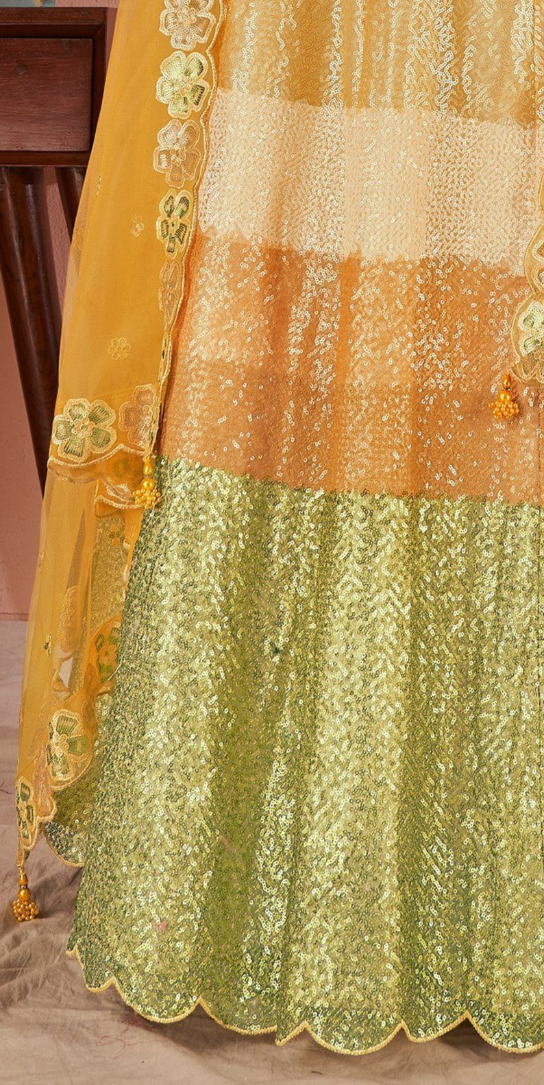 WOMEN'S YELLOW AND GREEN MULTI PREMIUM NET SEQUANCE AND MULTI THREAD WORK PARTY WEAR LEHENGA CHOLI