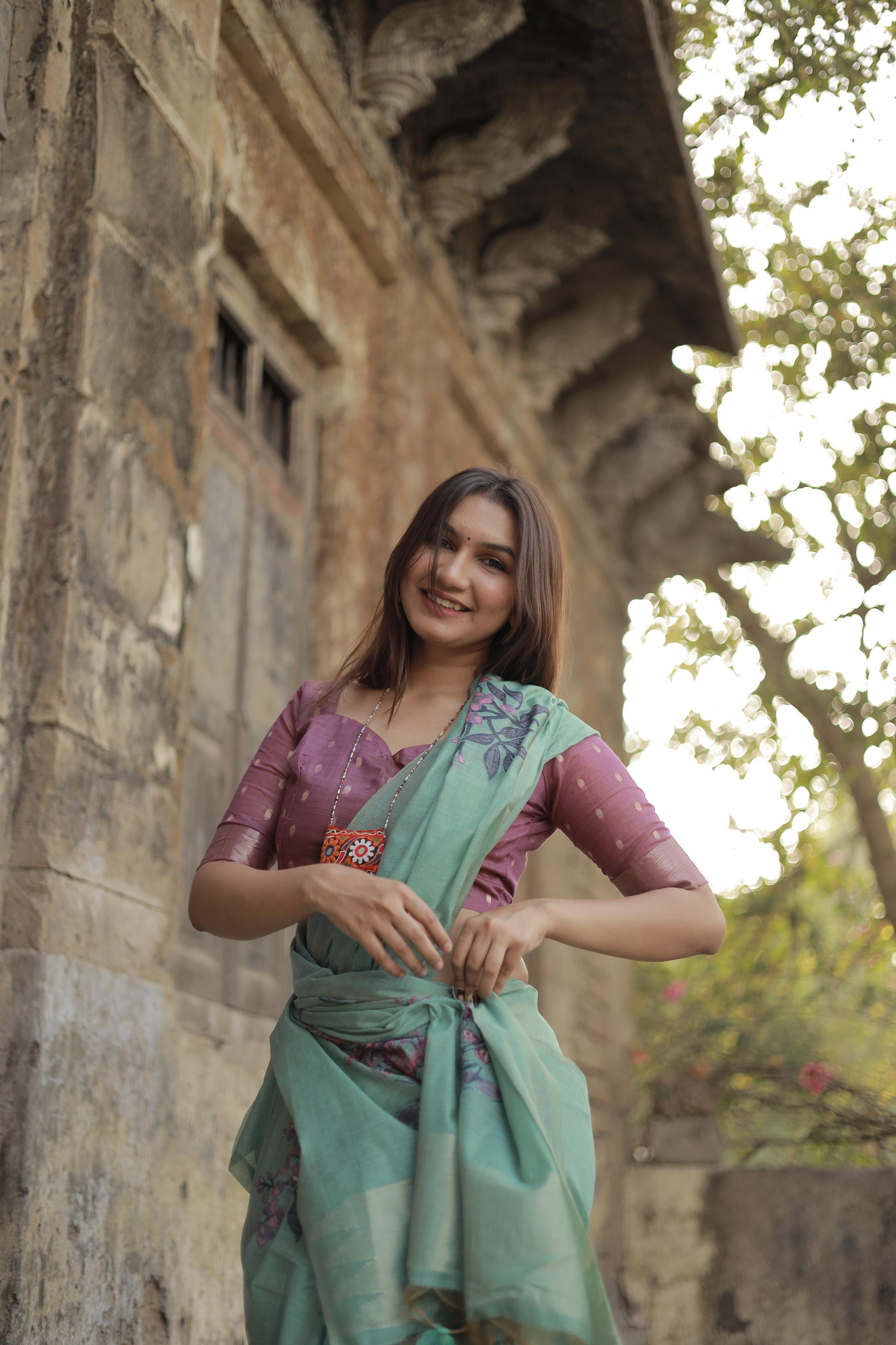 Vsaree Teal Muga Cotton Saree With Unique Floral Weaving Pattern With Small Zari Patta On Pallu With Blouse