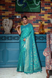 Vsaree Teal Raw Silk Saree With All Over Zari Weaving Pattern And Zari Border And Blouse