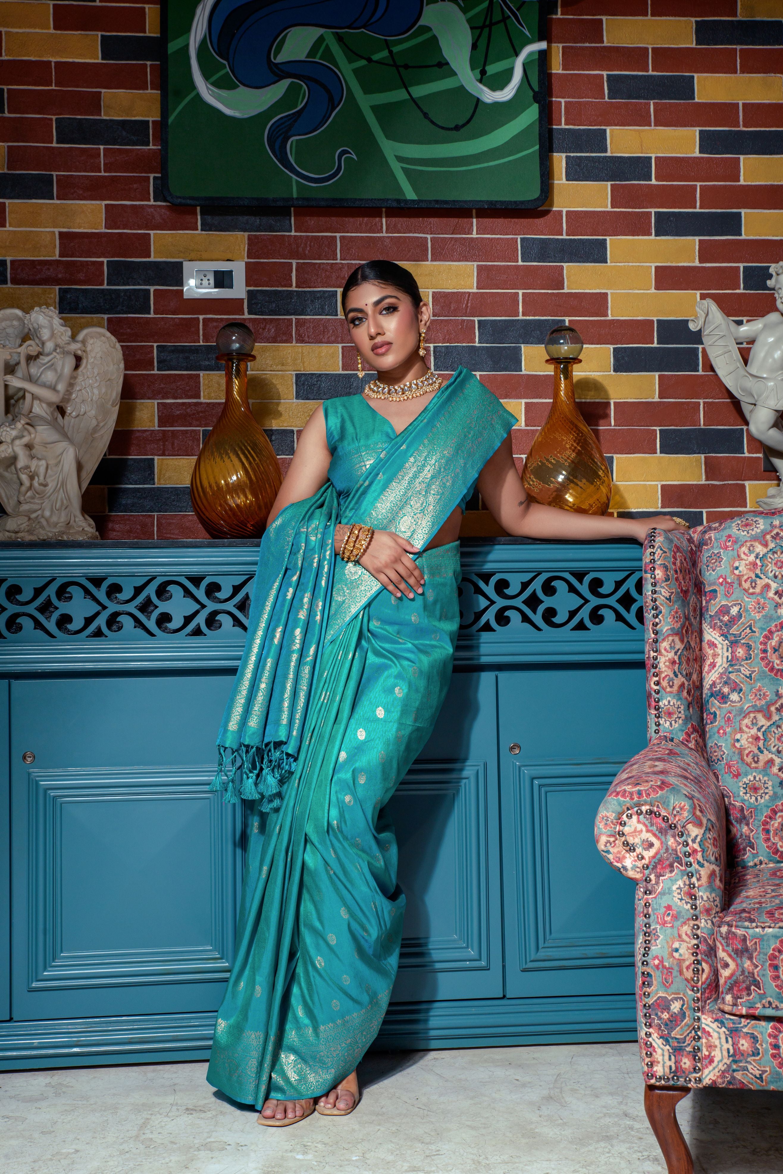 Vsaree Teal Raw Silk Saree With All Over Zari Weaving Pattern And Zari Border And Blouse