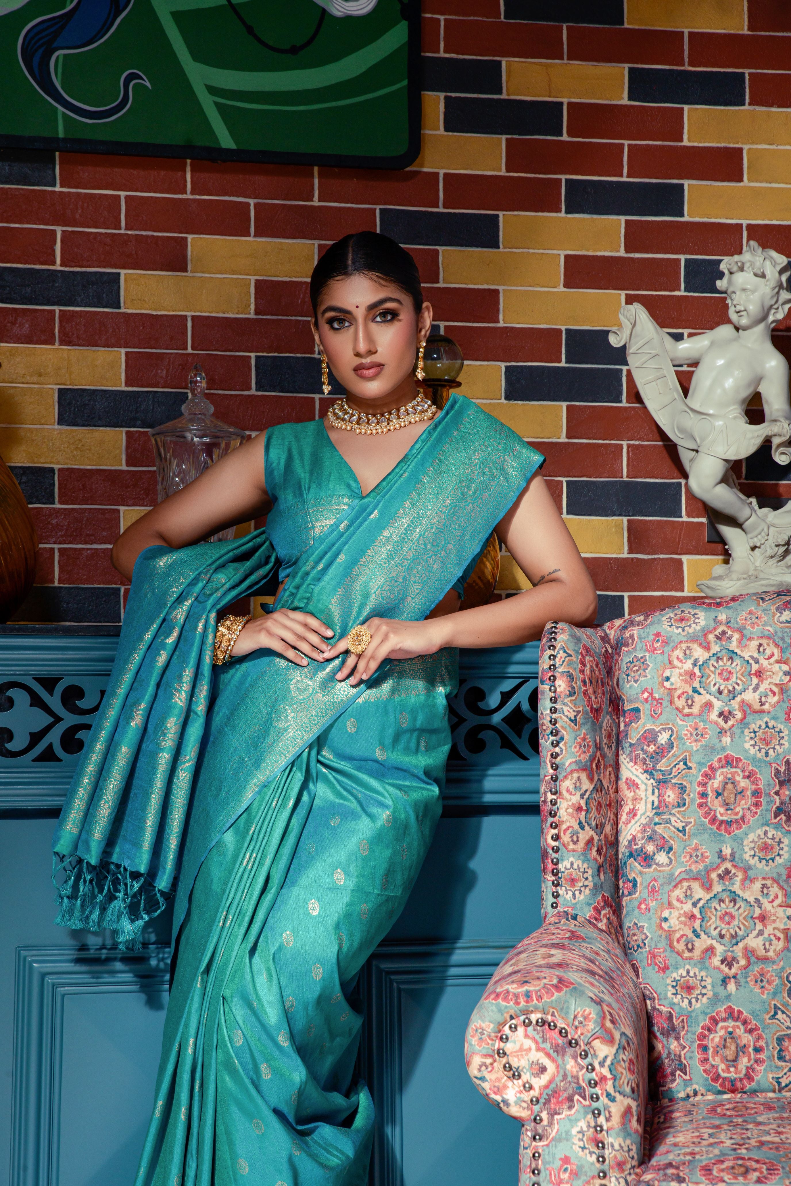 Vsaree Teal Raw Silk Saree With All Over Zari Weaving Pattern And Zari Border And Blouse