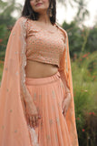 WOMEN'S FAUX GEORGETTE WEDDING LEHENGA IN PEACH AND MAJENTA WITH ZARI WORK