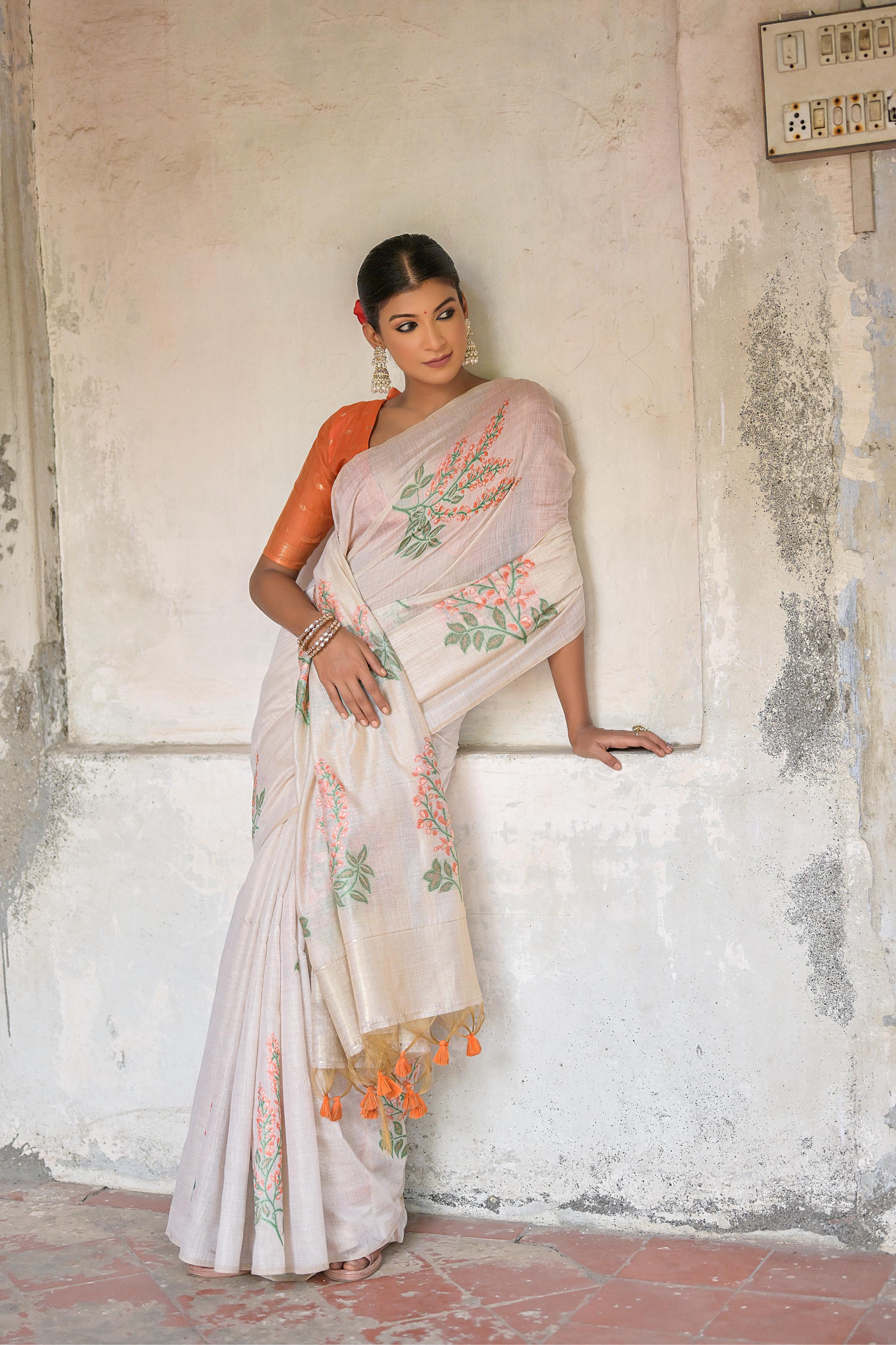 Vsaree Orange Muga Cotton Saree With Unique Floral Weaving Pattern With Small Zari Patta On Pallu With Blouse