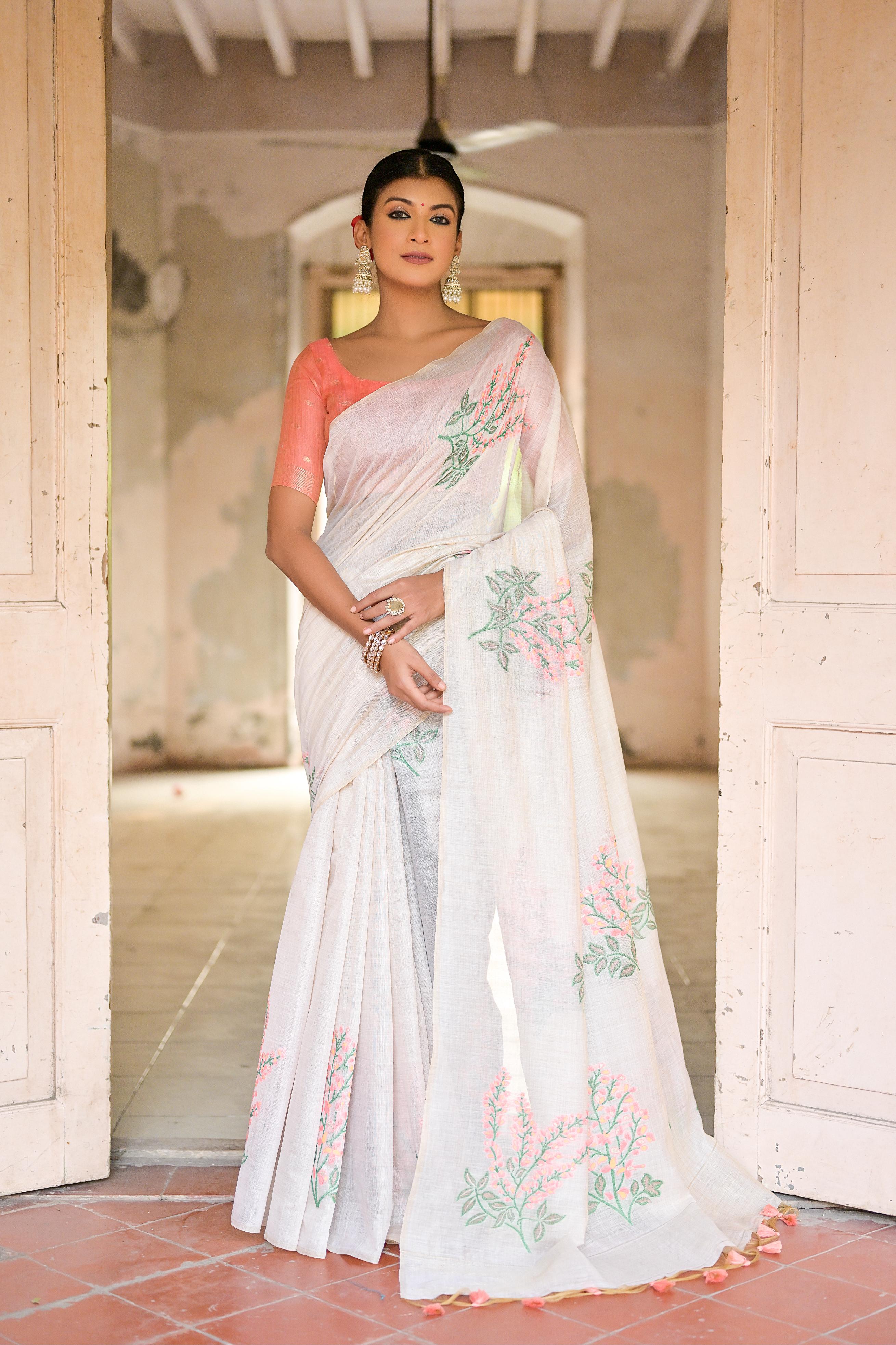 Vsaree Peach Muga Cotton Saree With Unique Floral Weaving Pattern With Small Zari Patta On Pallu With Blouse