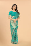 Women's Firozi color With Golden Zari Lichi silk saree with Customize blouse piece